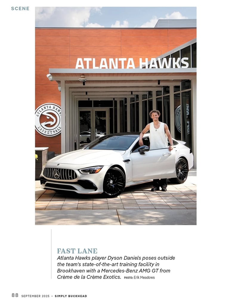 Atlanta Hawks player Dyson Daniels poses with a white Mercedes-Benz AMG GT