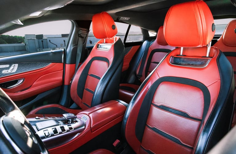 Luxury car interior with red leather seats